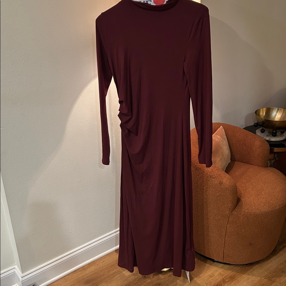 Commence plus size Ruching on the mock neck and on one side of waist.
